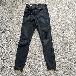 Black embroidered Joe’s skinny jeans